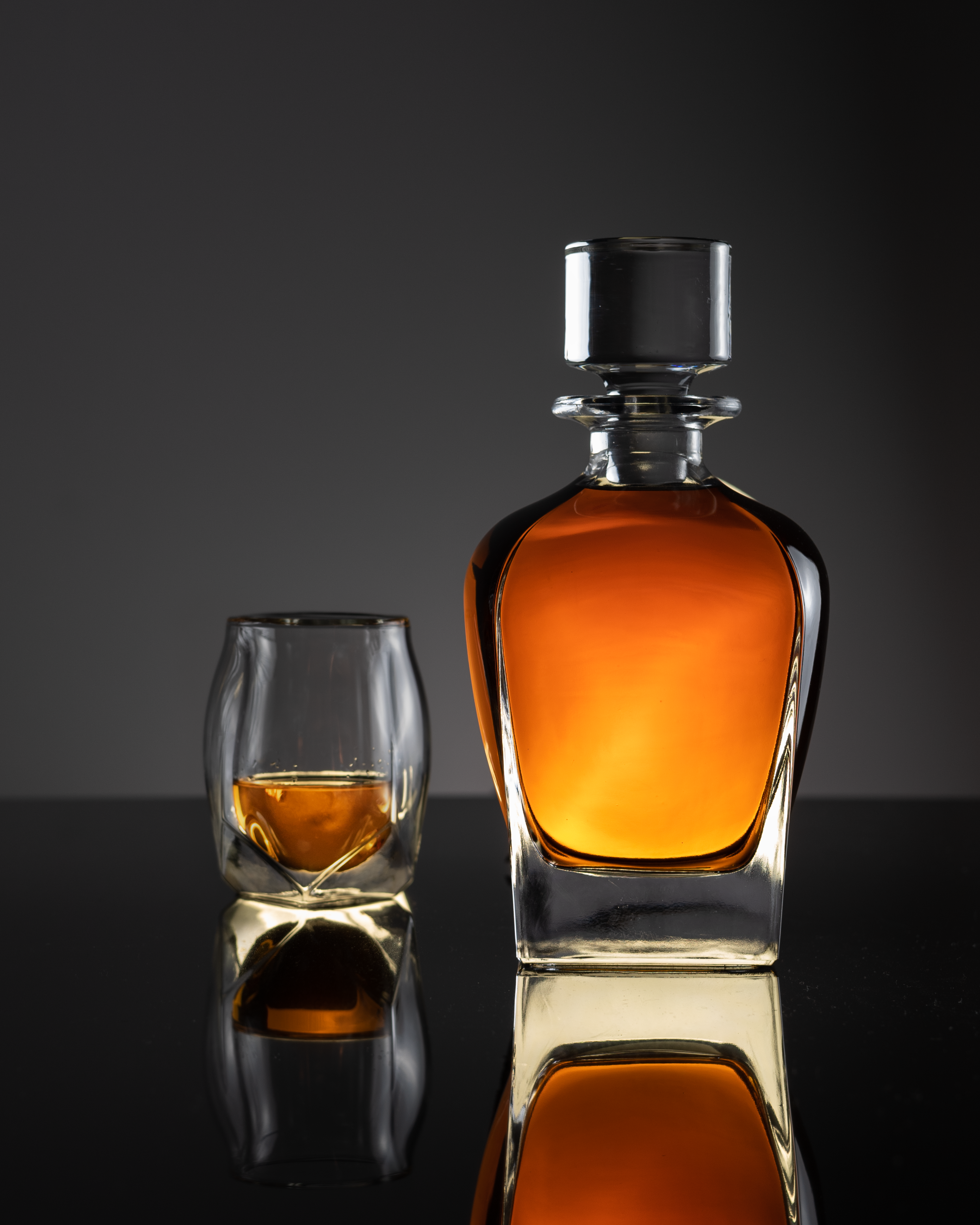 A whisky decanter and whisky glass