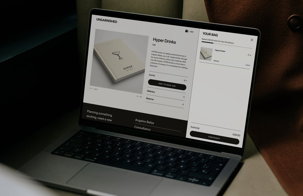 Laptop displaying the Ungarnished website with an open slide-out shopping cart drawer featuring a free delivery progress bar, item controls, and a checkout button.